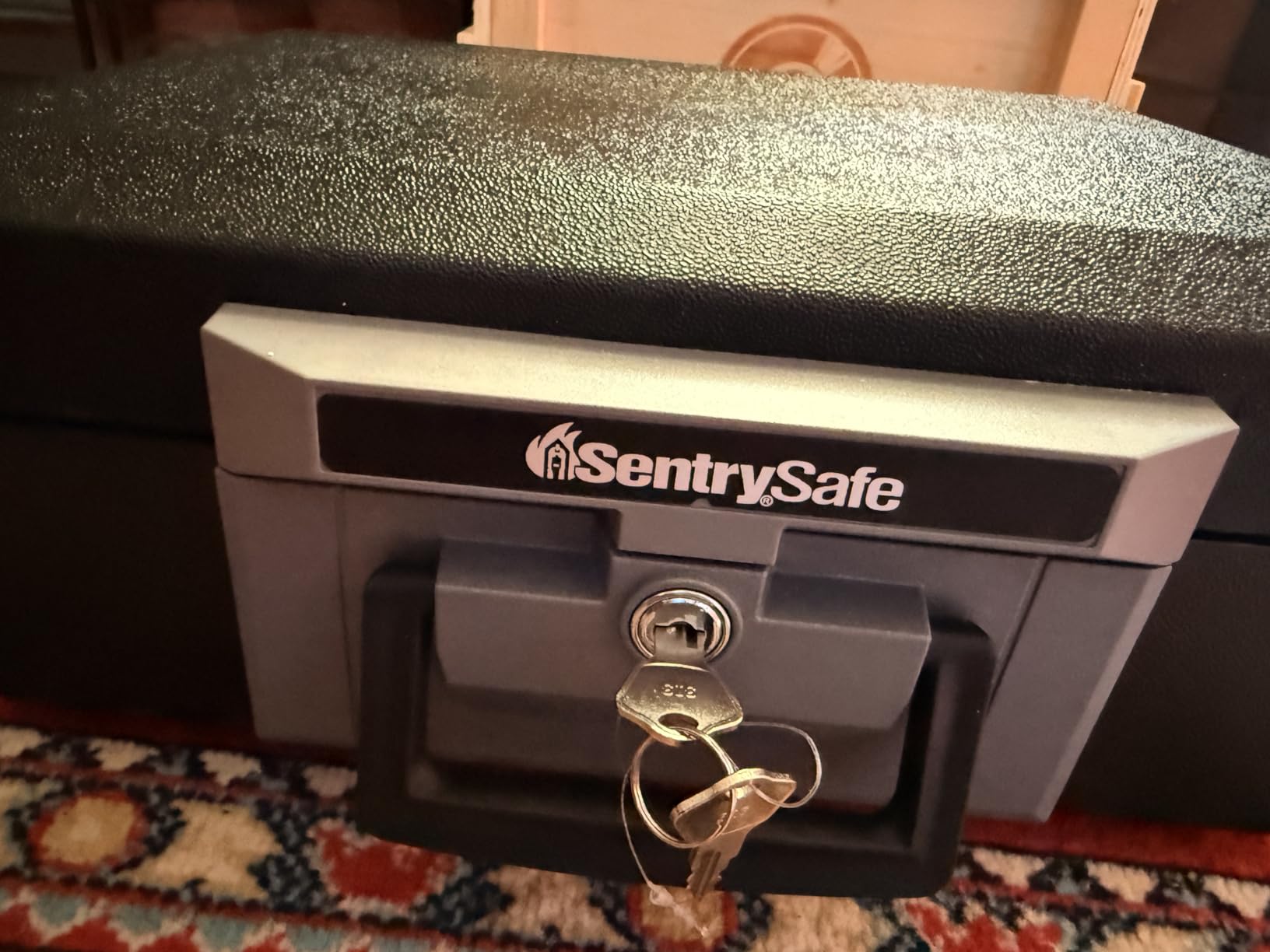 SentrySafe Fireproof Safe Box with Key Lock, Chest Safe with Carrying Handle to Secure Money, Jewelry, Documents, 0.25 Cubic Feet, 6.3 x 15.3 x 12.1 Inches, 1160 customer photo 1