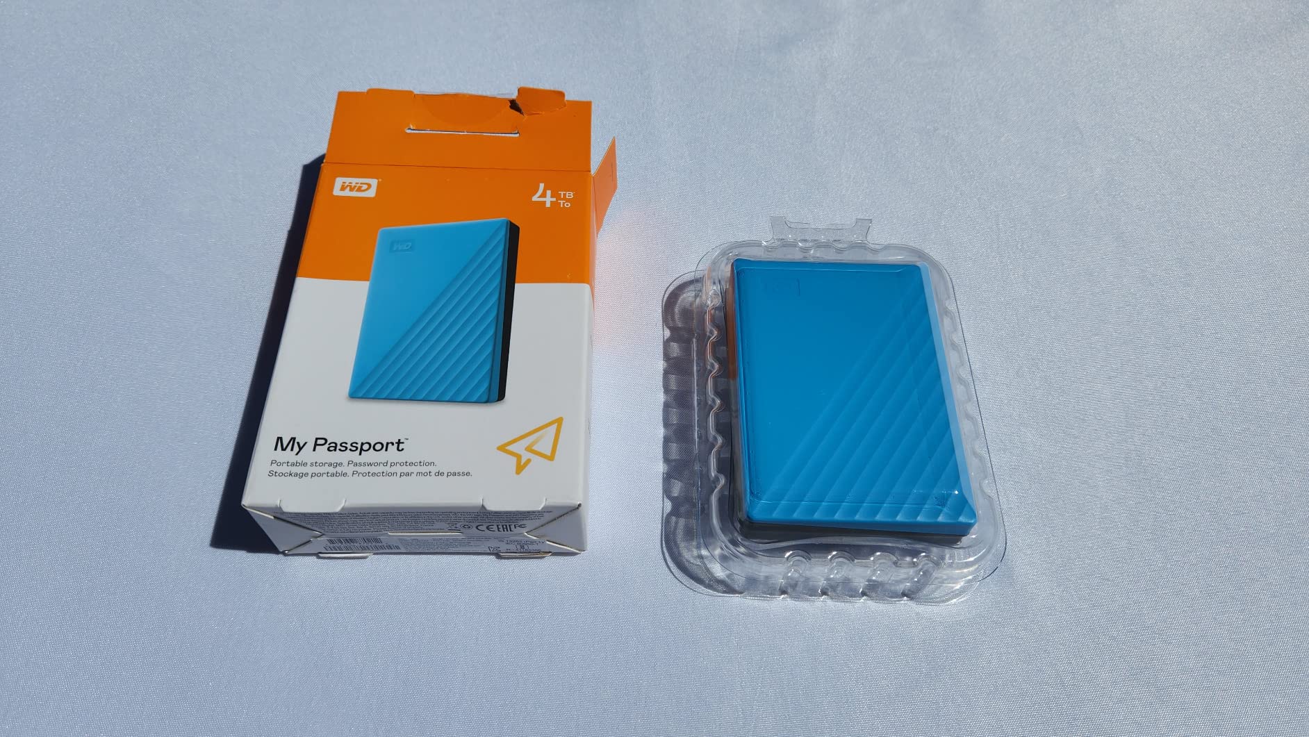 WD 4TB My Passport, Portable External Hard Drive, Blue, backup software with defense against ransomware, and password protection, USB 3.1/USB 3.0 compatible - WDBPKJ0040BBL-WESN customer photo 1