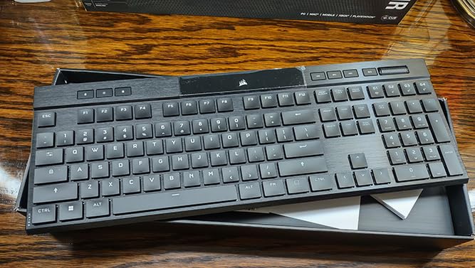 Corsair K100 RGB Optical-Mechanical Wired Gaming Keyboard - QWERTY US Layout, OPX Switches - PBT Double-Shhot Keycaps - Elgato Stream Deck and iCUE Compatible - Black customer photo 1