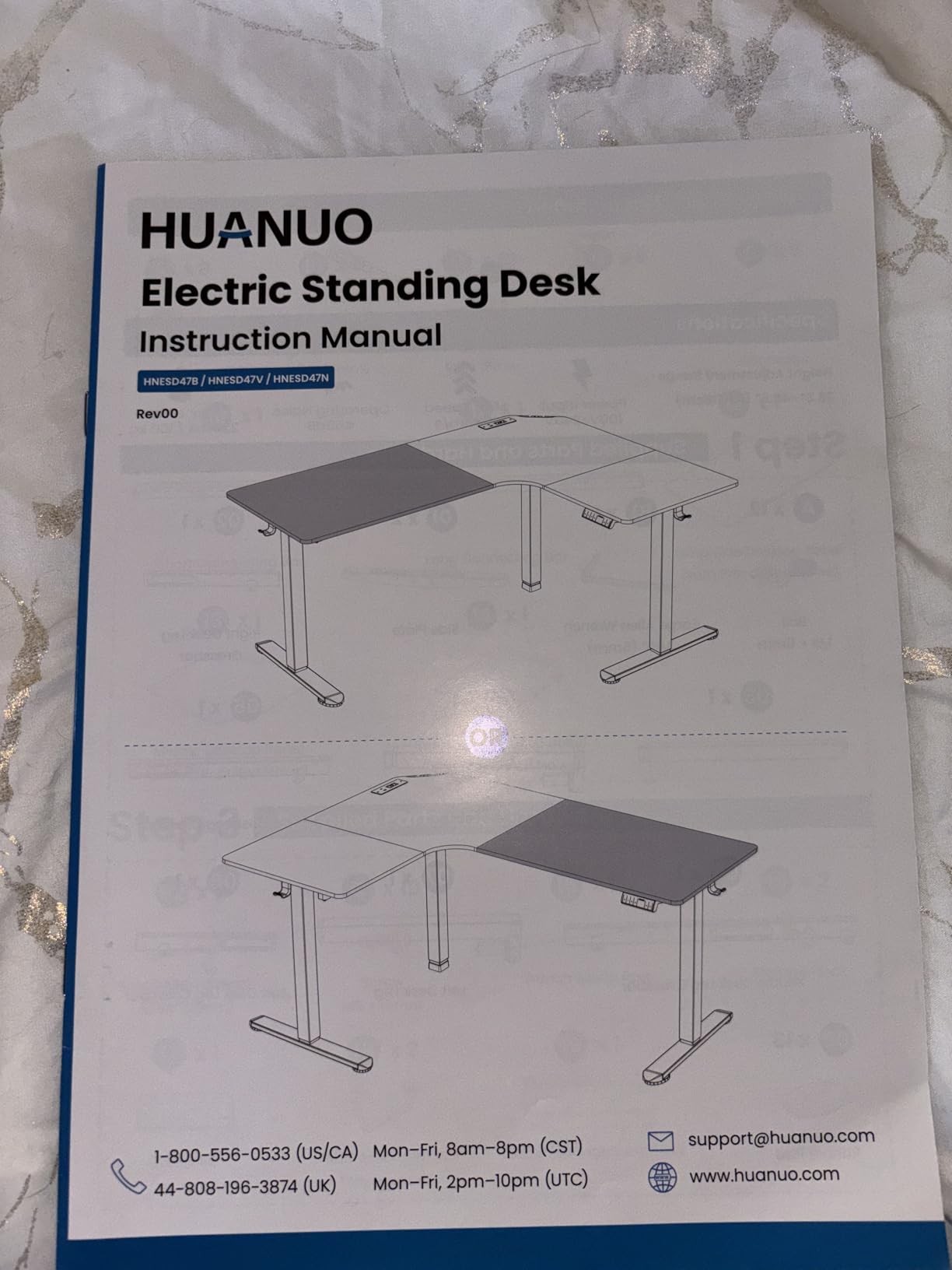 HUANUO 63 Inch L-Shaped Standing Desk, Built-in Power Outlets, Electric Height Adjustable Corner Computer Desk, Large Power Strip Holder, Sit Stand Up Desk with 3 Preset Heights, Black customer photo 1