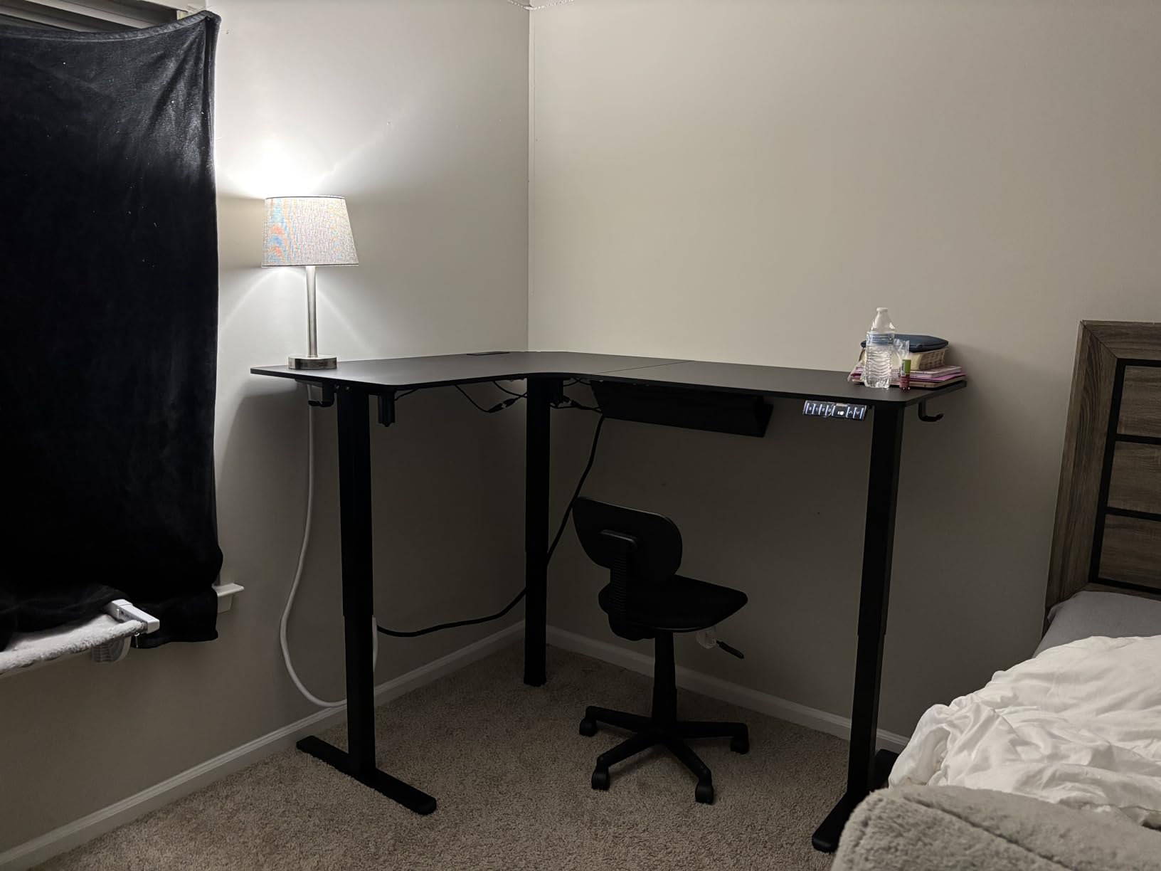 HUANUO 63 Inch L-Shaped Standing Desk, Built-in Power Outlets, Electric Height Adjustable Corner Computer Desk, Large Power Strip Holder, Sit Stand Up Desk with 3 Preset Heights, Black customer photo 2