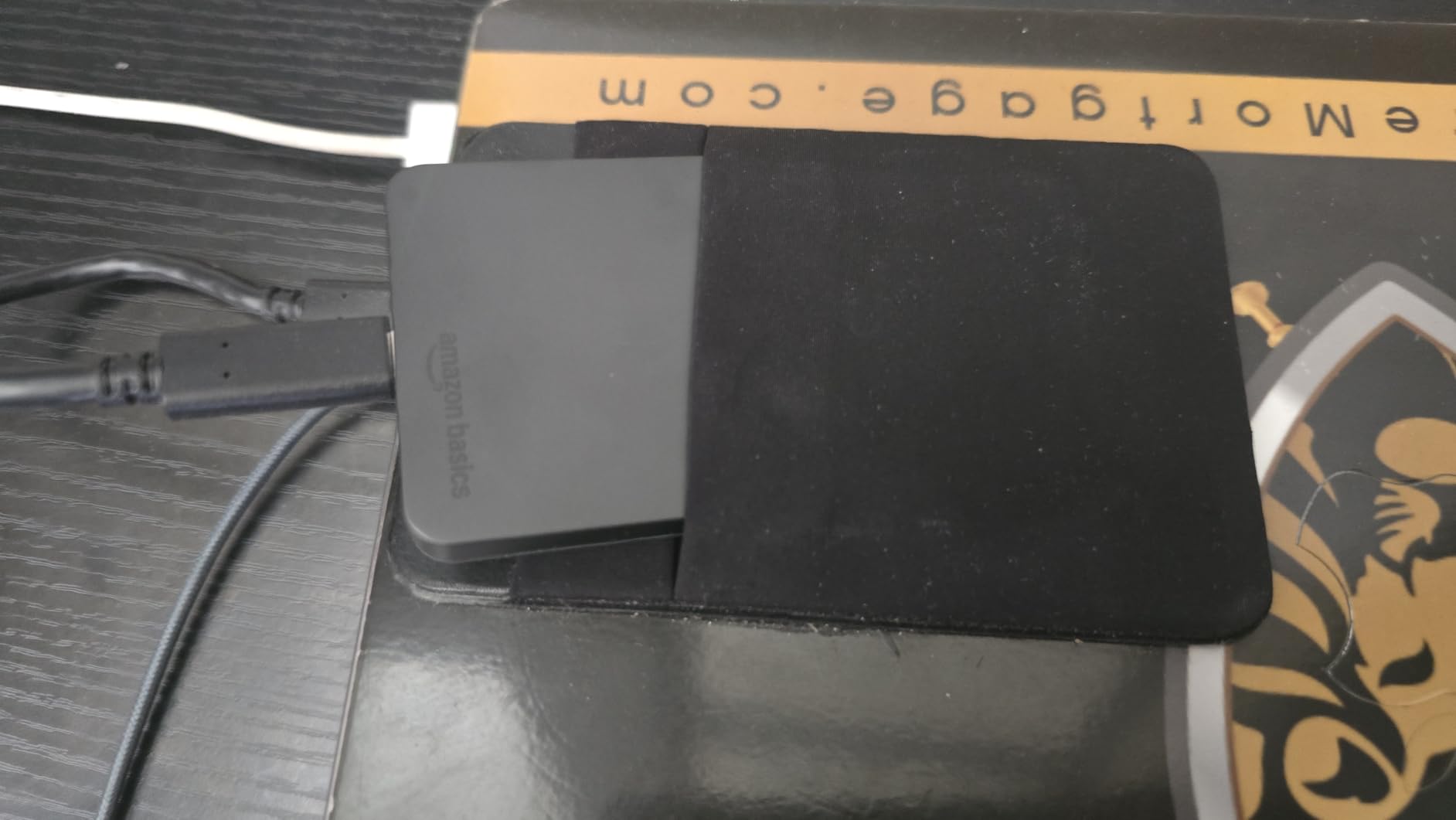 Amazon Basics Portable External SSD, 1TB, 2000MB/s Speeds, USB 3.2 Gen 2, IP65 Water & Dust Resistant, Black customer photo 1