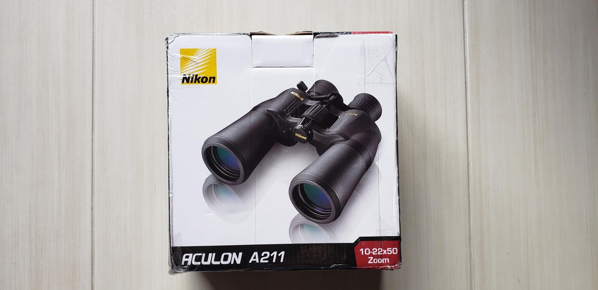 Nikon ACULON A211 10x50 Binocular | Multilayer coating, Porro prism Binocular with turn and slide eyecups, Tripod Adaptable | Official Nikon USA Model customer photo 1