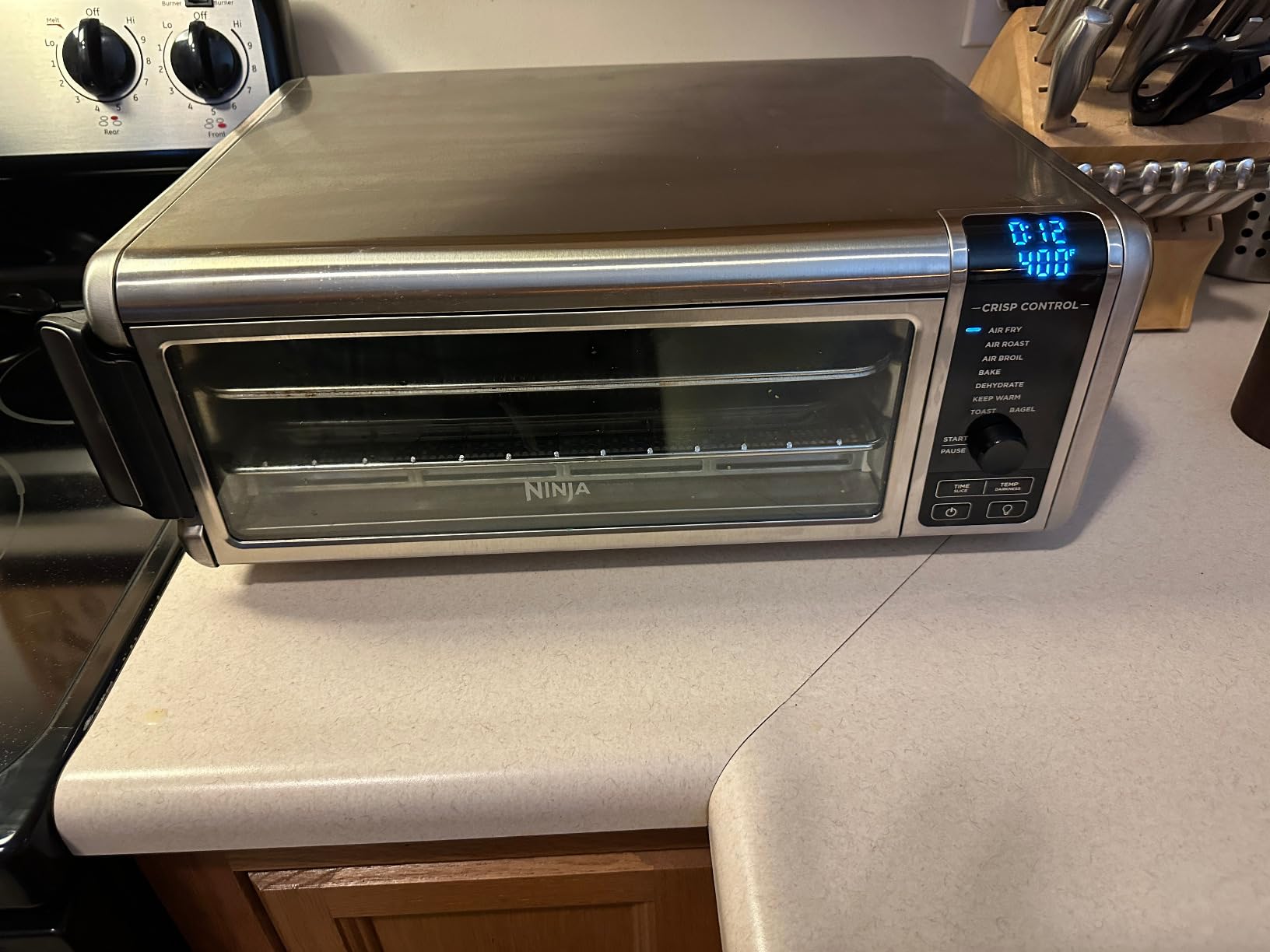 Ninja Air Fryer Toaster Oven Combo | 8-in-1 Functionality | Flip Up & Away for Storage Space | Air Fry Basket, Sheet Pan, Wire Rack & Removable Crumb Tray |1800 Watt | Stainless Steel | SP151 customer photo 1