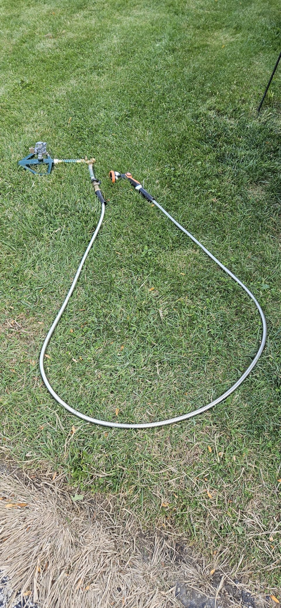 Expandable Garden Hose 150ft, 2026 Reinforced No Kink Retractable Water Hose 150 ft, 10 Function Nozzle, Solid Brass Fittings, Durable Latex Core, Lightweight, Flexible for Gardening, Car Washing customer photo 1