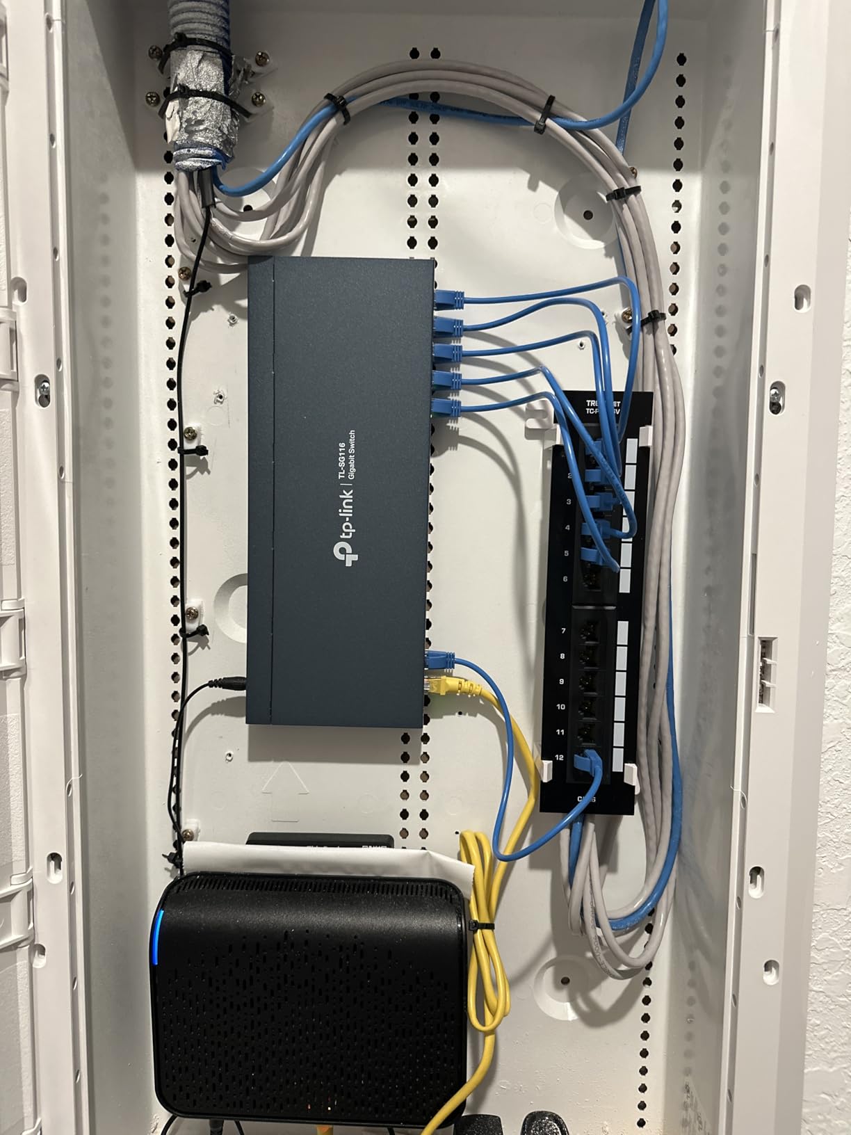 TRENDnet 12-Port Cat6 Unshielded Patch Panel, TC-P12C6V, Wall Mount, Included 89D Bracket, Vertical or Horizontal Installation, Compatible w/ Cat5e & Cat6 RJ45 Cabling, 110 IDC Type Terminal Blocks customer photo 1