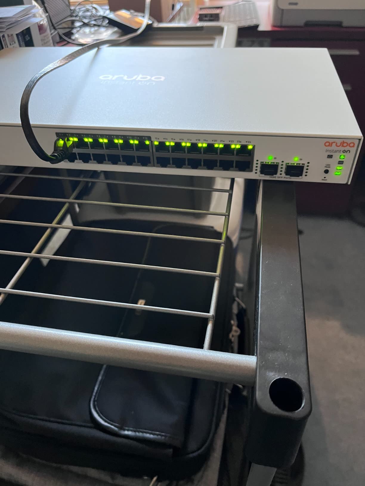 HPE Networking Instant On Switch Series 1830 24-Port Gb Smart-Managed Layer 2 Ethernet Switch | 24x 1G | 2X SFP | Fan-Less | US Cord (JL812A#ABA) customer photo 1