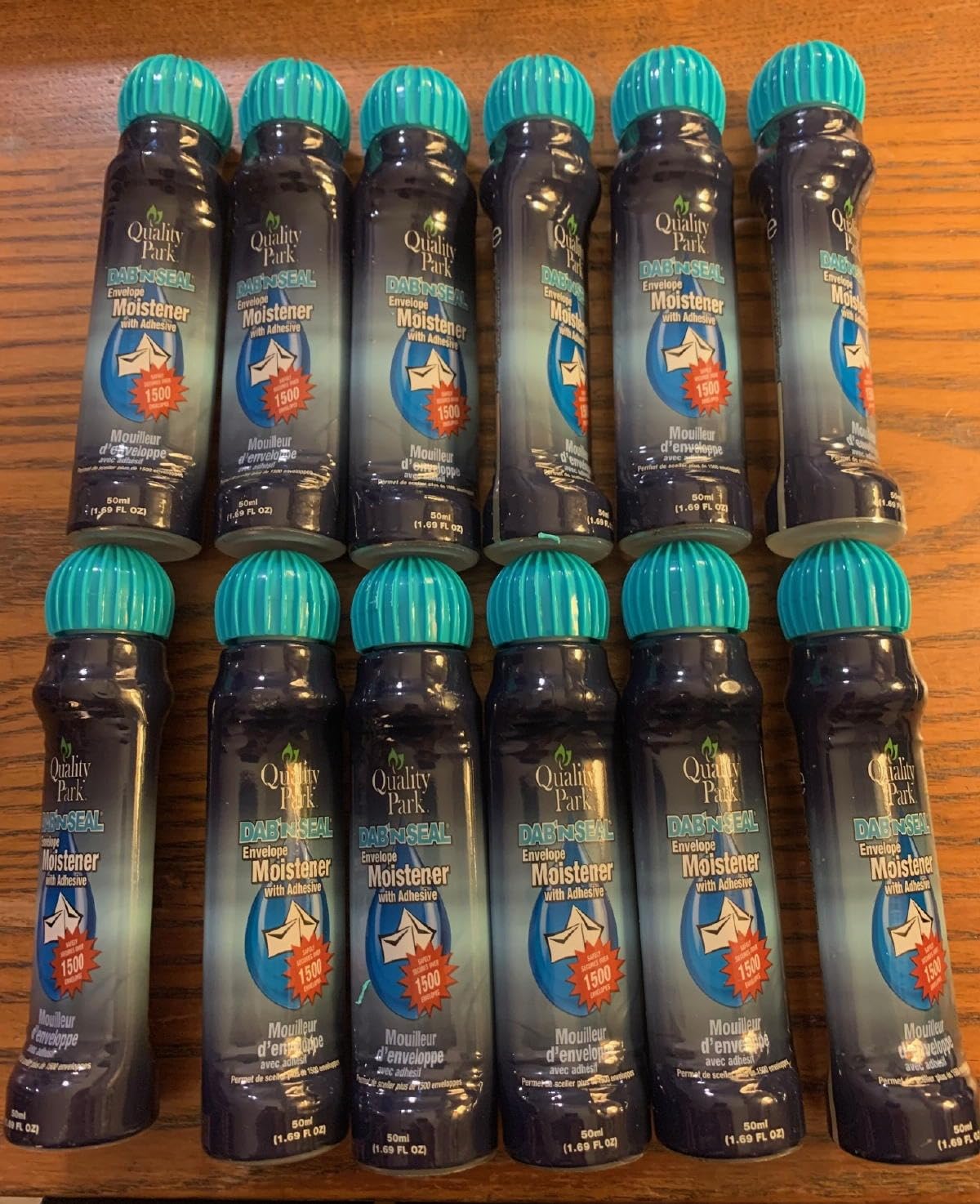 Quality Park Bulk Dab-N-Seal Envelope Moistener with Adhesive, for Securely Sealing Envelopes, Paper Crafts & More, 50mL Bottles, 12 Pack (QUA46062) customer photo 1