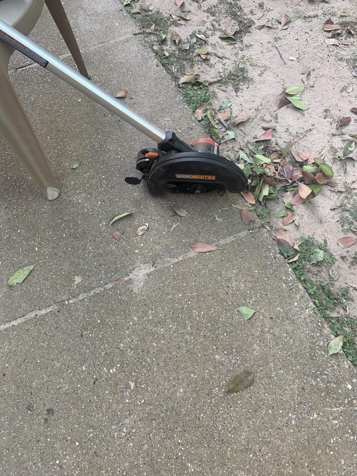 WORX Cordless Lawn Edger, 7'' Grass Edger with 3 Depth Settings, 20V Trencher with Dual Wheels & Brushless Motor, 4.0 Ah Battery & Charger Included, WG898 customer photo 1