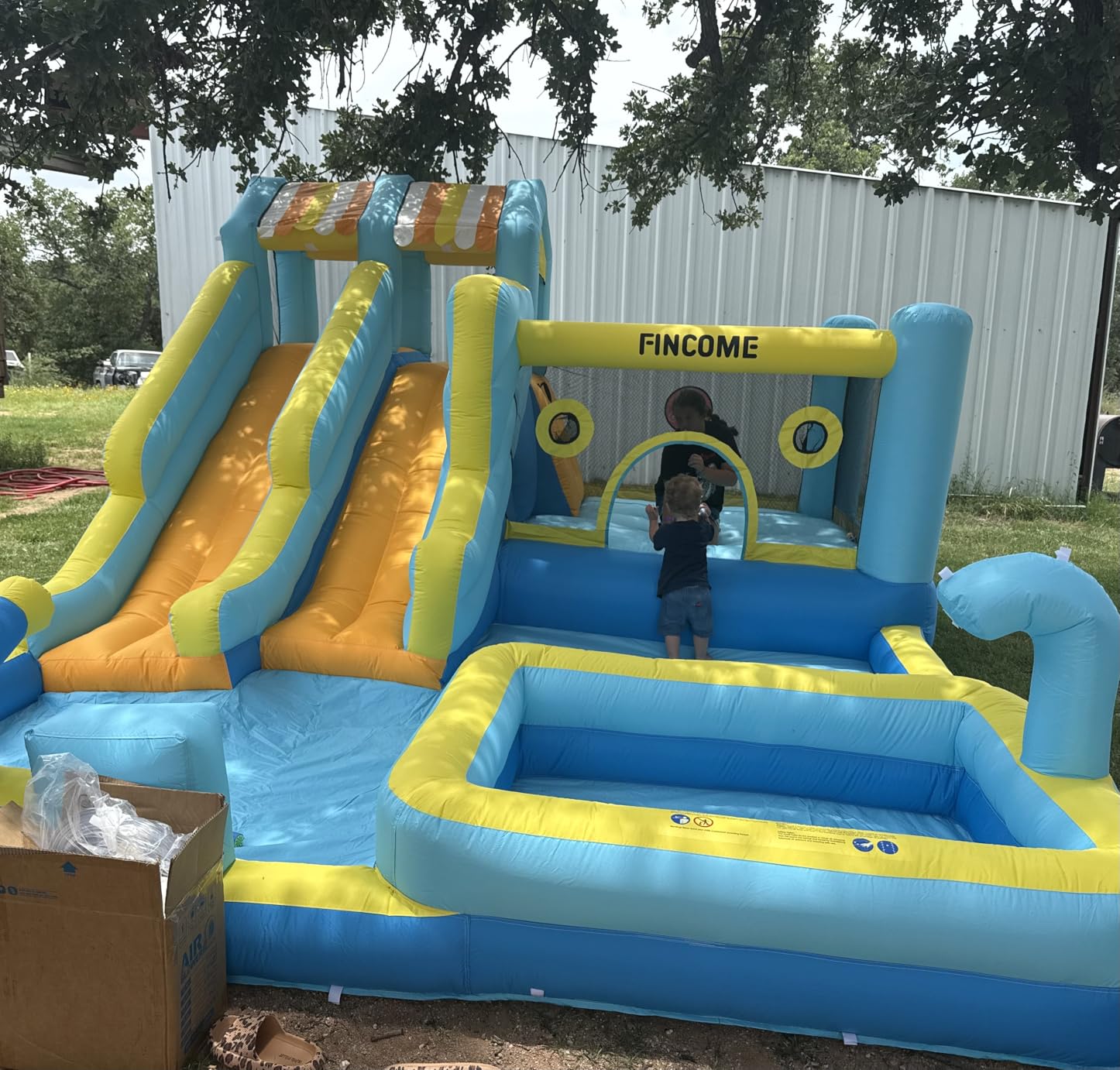 FINCOME Inflatable Bounce House, 10 in 1 Double Water Slide Bounce House with 750W Blower, Climbing Wall, Jumping, Water Gun, Splash Pool, Basketball Hoop for Kids Indoor Outdoor Backyard customer photo 2