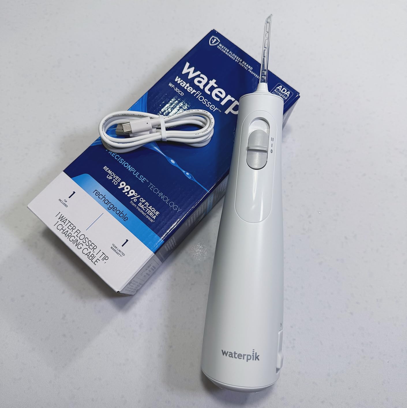 Waterpik Cordless 1100 Rechargeable Portable Water Flosser for Teeth Cleaning and Flossing, Travel, Braces Care, Healthier Gums, Waterproof for Shower, ADA Accepted, WF-30CD White customer photo 2