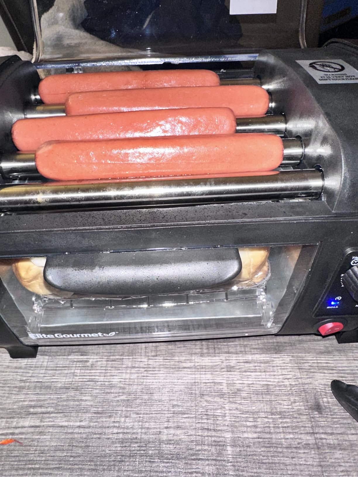 Elite Gourmet 8 Hot Dog Roller & Toaster Oven | 5 Stainless Steel Rollers, 30-Min Timer, Auto Shut-Off, 2 Warming Racks, Bun Warmer, Drip Pan | Cooks Brats, Sausages, Taquitos | Red customer photo 2