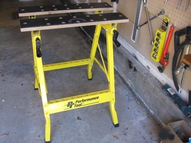 Performance Tool W54025 Portable Folding Workbench and Vise | 200 lb capacity folding work table. Printed grid, ruler and protractor. Includes 4 bench dogs and tool storage rail customer photo 1