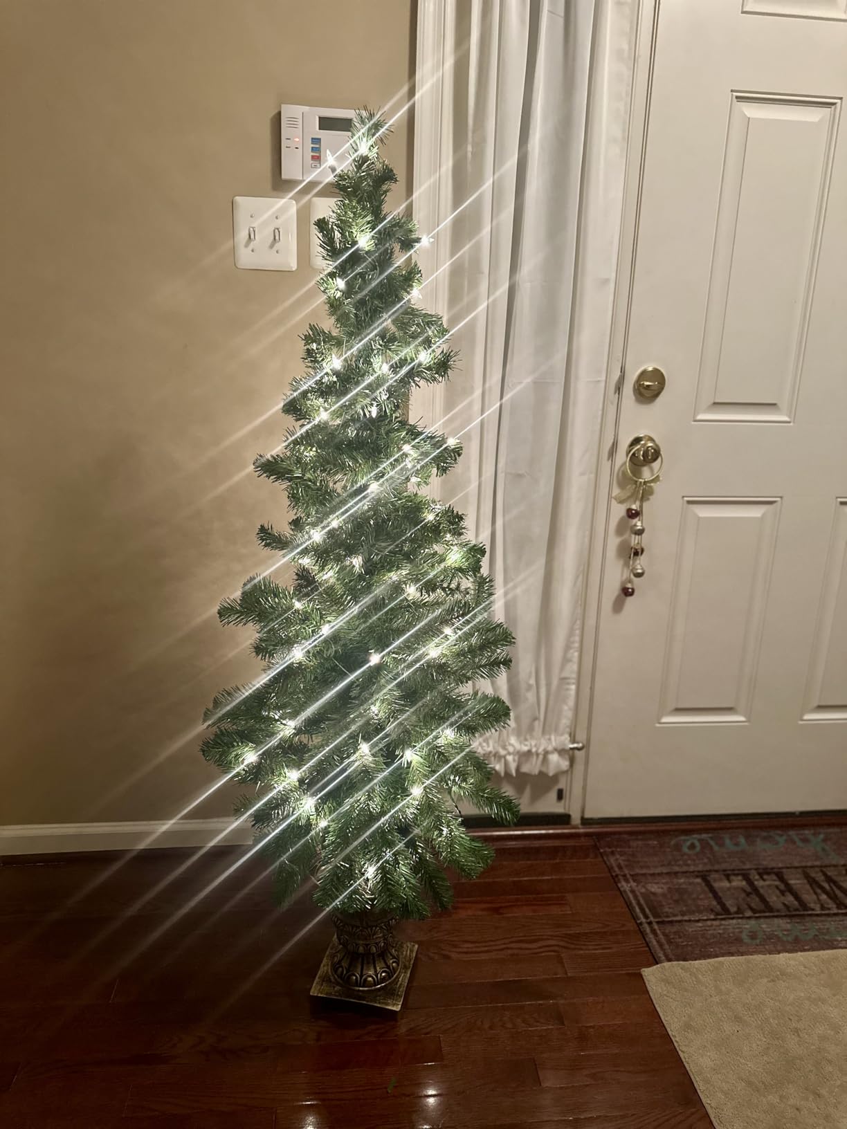 National Tree Company 5 ft Pre-Lit Montclair Spruce Artificial Christmas Entrance Tree, 100 Clear Lights, 205 Tips, Gold Urn Base, Green customer photo 1