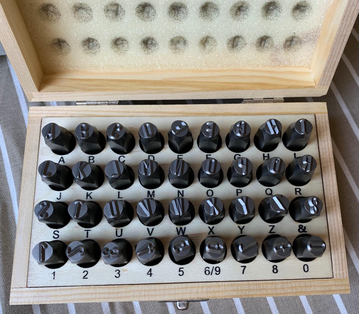 Amazon Basics Metal Stamping Kit, Alphabet and Number Stamps, 36-Piece Set with Wood Storage Case, 5/16 inch customer photo 1