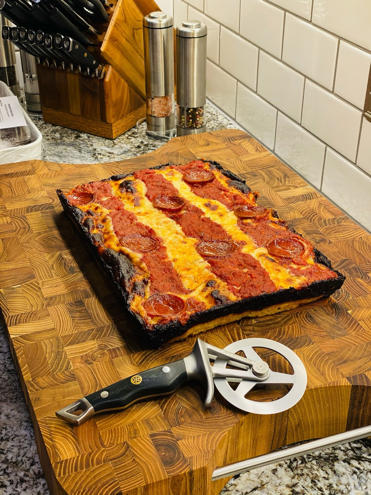 Dalstrong Orbit Razor Pizza Cutter Wheel - 2mm #304 Stainless, Tri-Spoke Rotary, G-10 Handle - For Homemade Pizza, Flatbread, Quesadillas, Pastry & Dough - Thumb Guard + Sheath Included customer photo 1