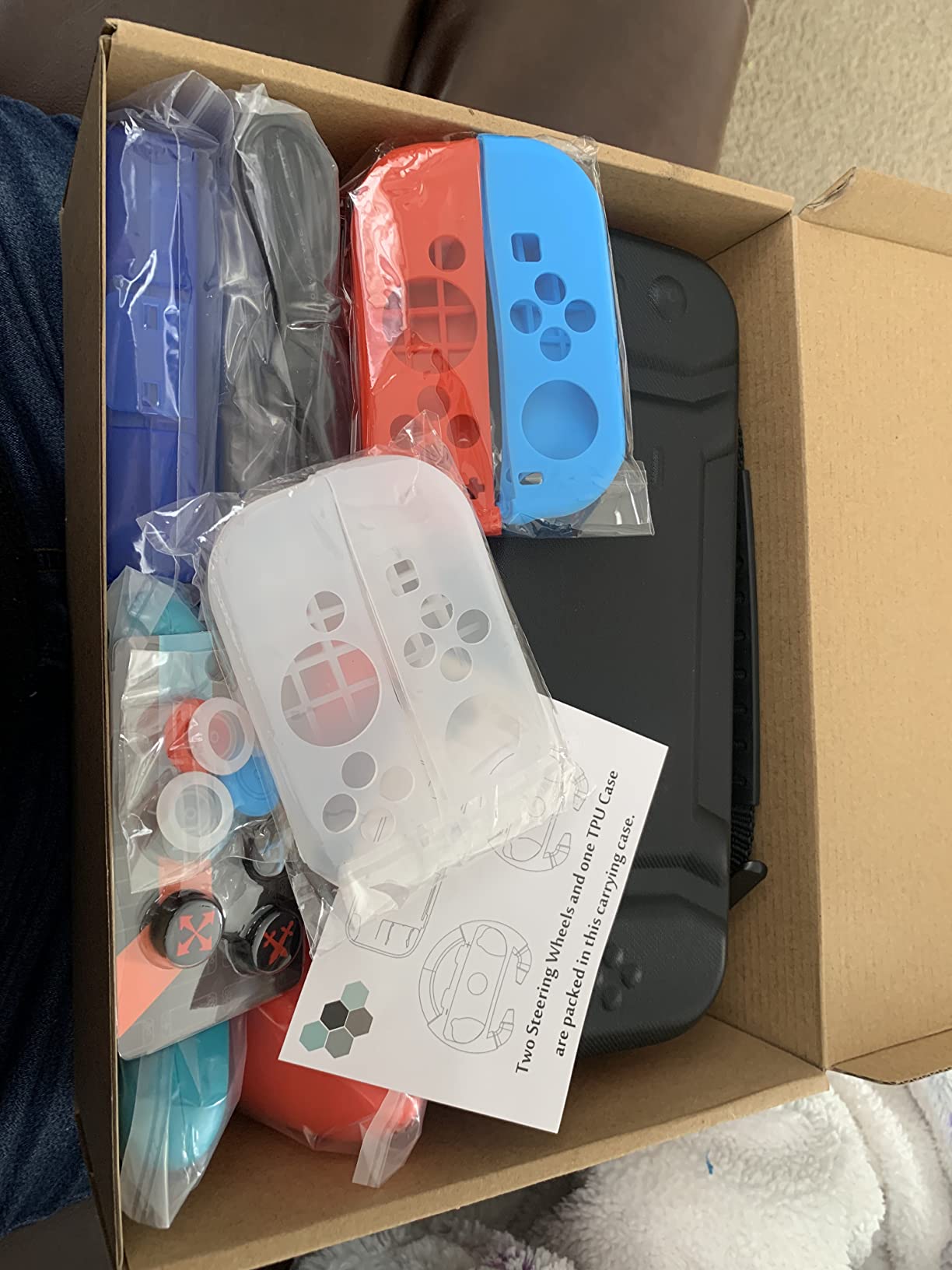 RTop 23 in 1 Accessories Bundle for Nintendo Switch OLED Model | Kit with Carrying Case, Screen Protector, Steering Wheels, Joycon Grips, Charging Dock, Playstand, Protective case and More customer photo 1