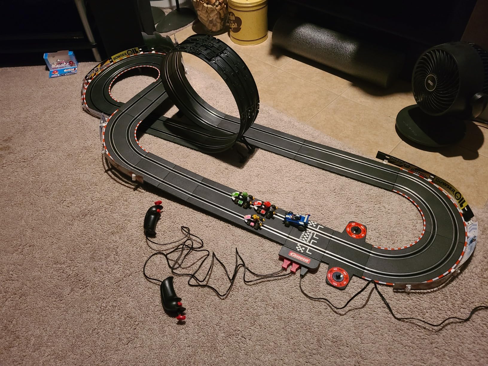 Carrera GO Mario Kart Electric Slot Car Race Track Set - Toy for Ages 6+ | Authentic Mario toys racing set. Features Mario & Luigi cars, 2 dual speed controllers & high-speed electric track customer photo 2