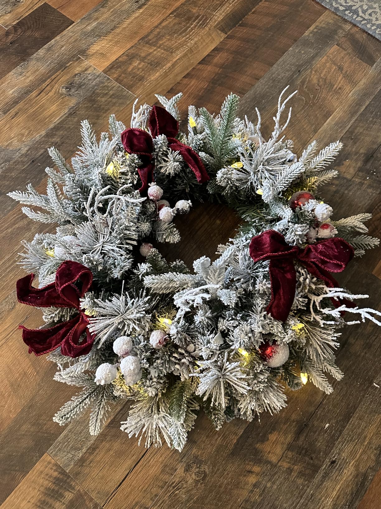 Pre-lit Snow Christmas Wreath with Red Balls,Berries and Bows,24 Inch 50 Battery Operated LED Lights,Holiday Decoration for Front Door Outdoor customer photo 2