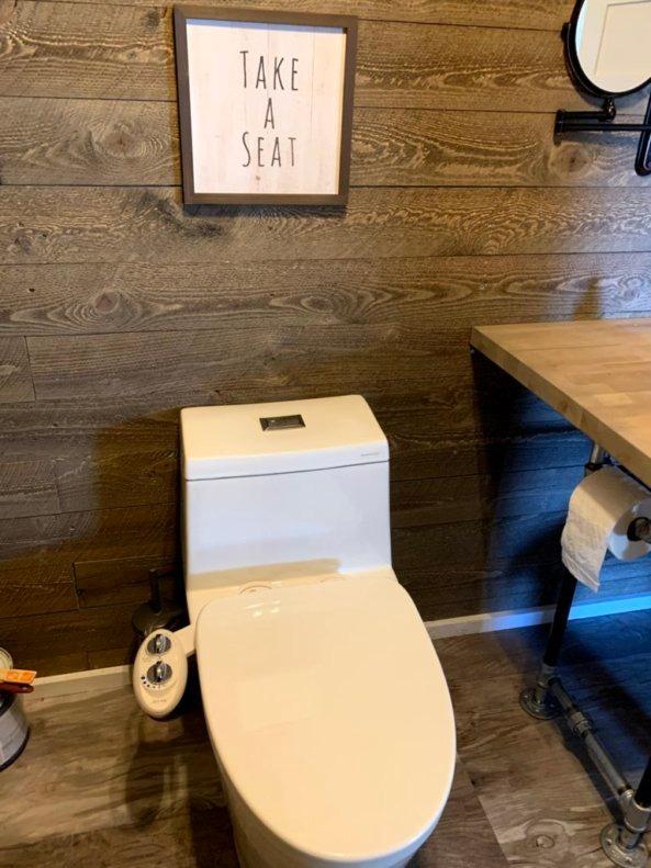 WOODBRIDGEE One Piece Toilet with Soft Closing Seat, Chair Height, 1.28 GPF Dual, Water Sensed, 1000 Gram MaP Flushing Score Toilet with Chorme Button, White,B0940-F-C customer photo 1