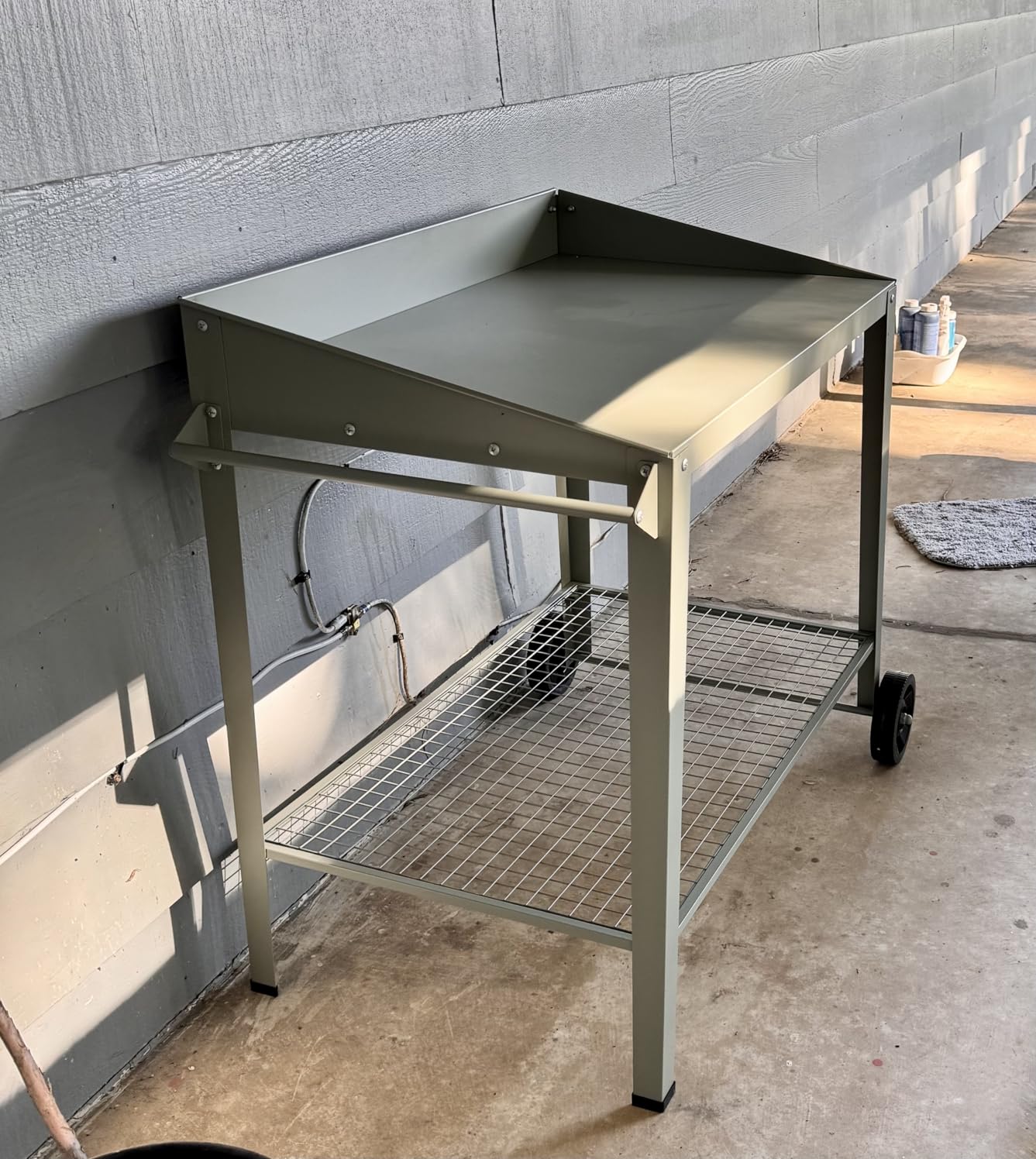 DDK Outdoor Metal Potting Bench with Wheels, Storage Shelf, Dark Gray | Rustproof All-Weather Metal, Raised-Edge Worktop, Wire Mesh Shelf, Sturdy No-Wobble Design, Easy Assembly customer photo 1