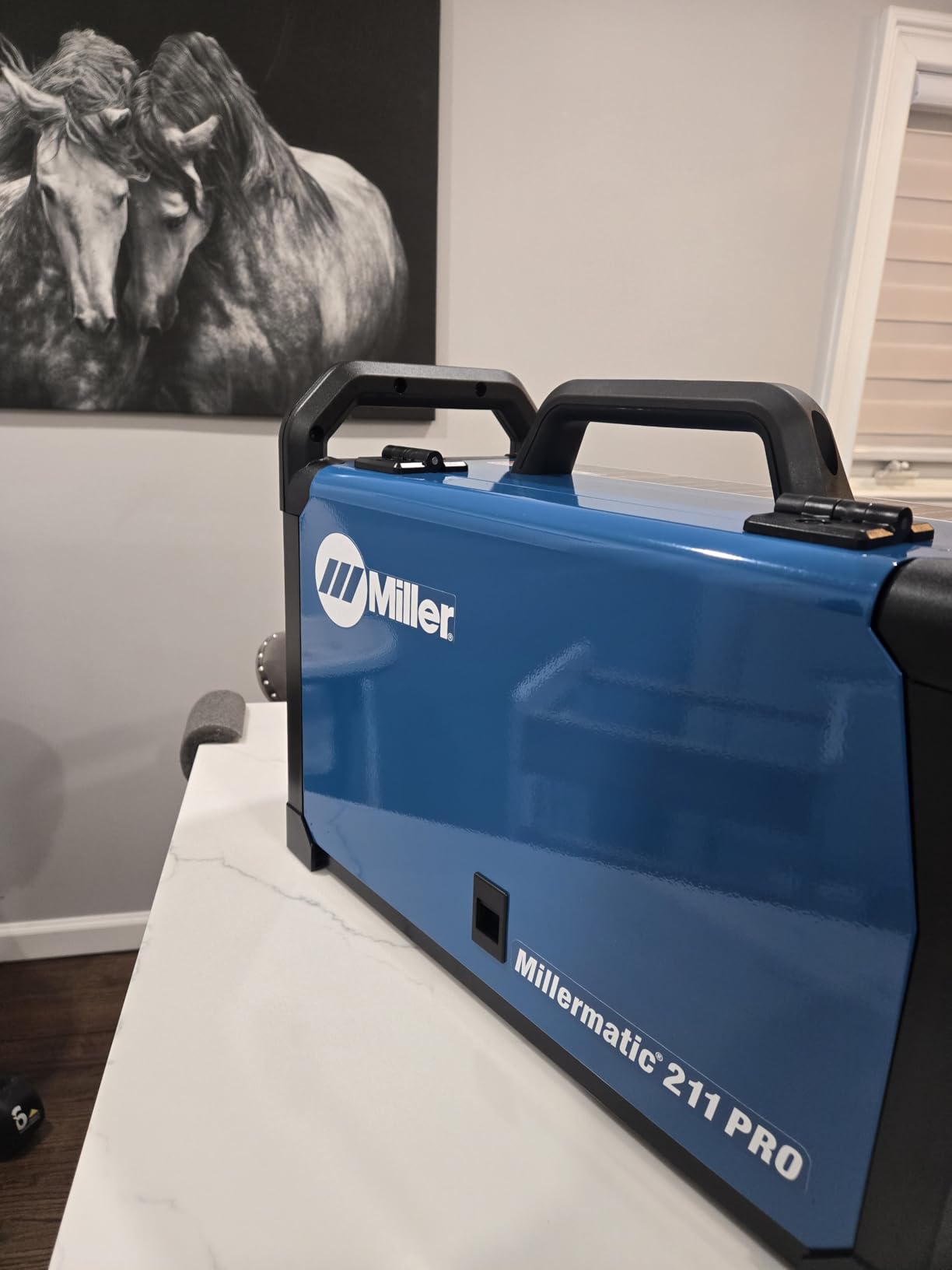 Millermatic® 211 PRO MIG Welder Machine, Dual-Voltage, Auto-Set™ | 120/240V MIG welder; Welds steel, aluminum to 3/8 in; thick; Features Auto-Set™, Dyna-Pulse™, upgradable software customer photo 1