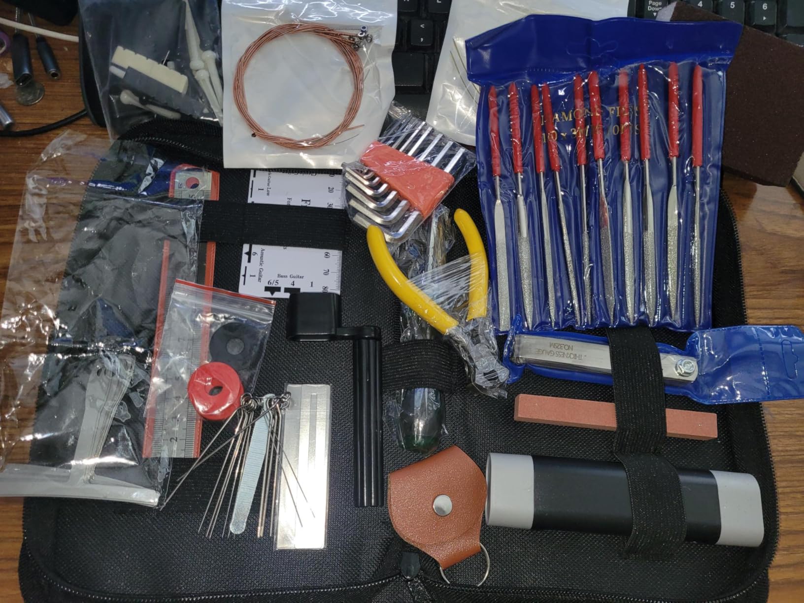 92Pcs Guitar Tool Kit, Guitar Repaire Maintenance Tool Kit with Carry Bag for Acoustic Electric Guitar Ukulele Bass Banjo, Guitar Accessories Gift for Music or String Instrument Enthusiast customer photo 2