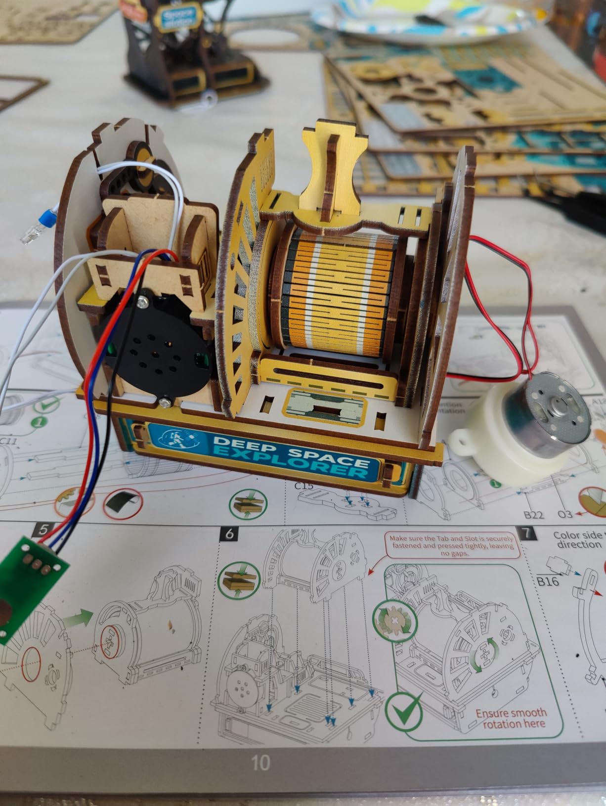 International Space Station Model, 3D Wooden Puzzle for Adults | Celestial Space Shuttle Starship Model Kit with Motorized Solar Panels, Radar, Thrusters, LED Light Effects (Celestigon Station) customer photo 1
