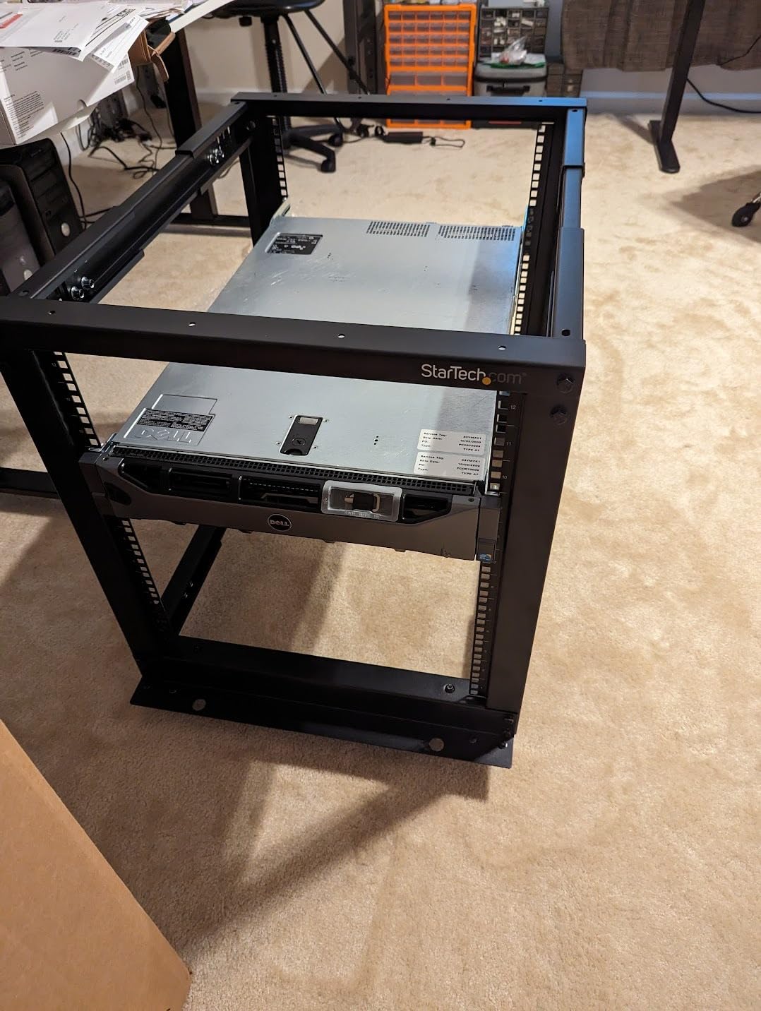 StarTech.com 12U Adjustable Depth Open Frame 4 Post Server Rack with Casters/Levelers and Cable Management Hooks 4POSTRACK12U Black customer photo 2